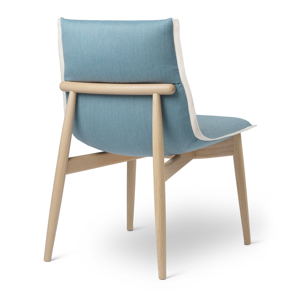 e004 embrace chair eoos contemporary wooden designer danish upholstered armless dining chair