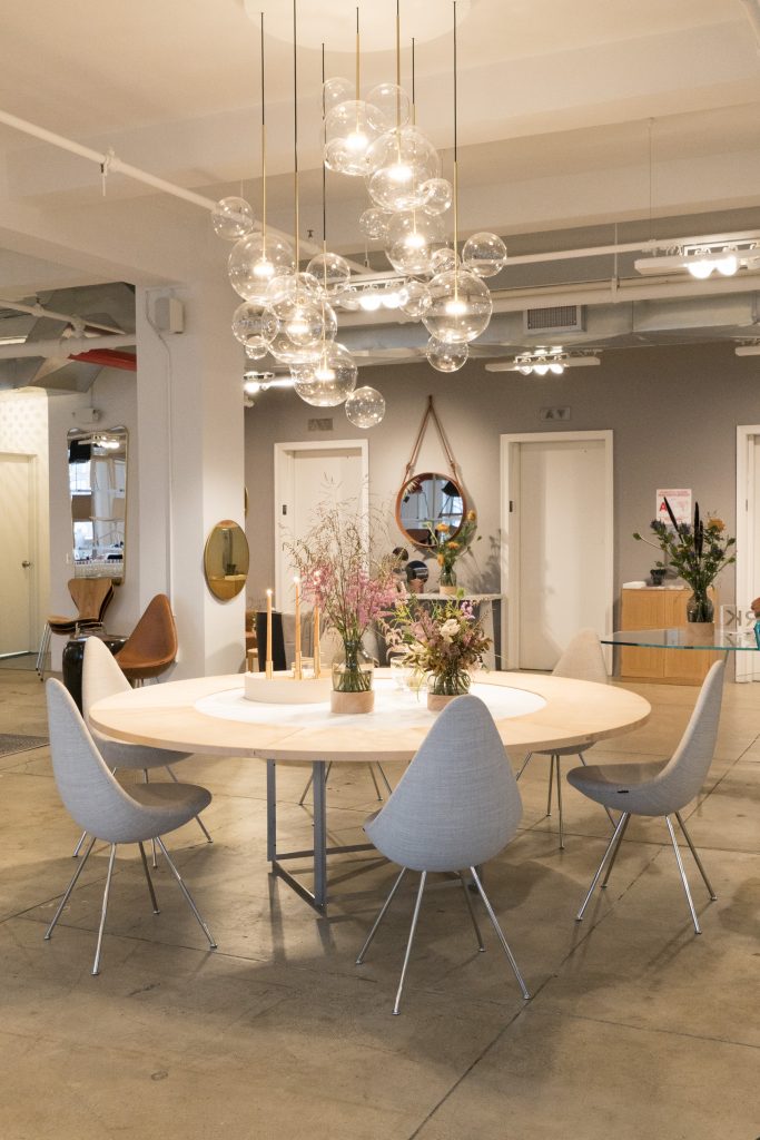 SUITE Ny showroom fritz Hansen accessories PK table drop chairs bolle chandelier